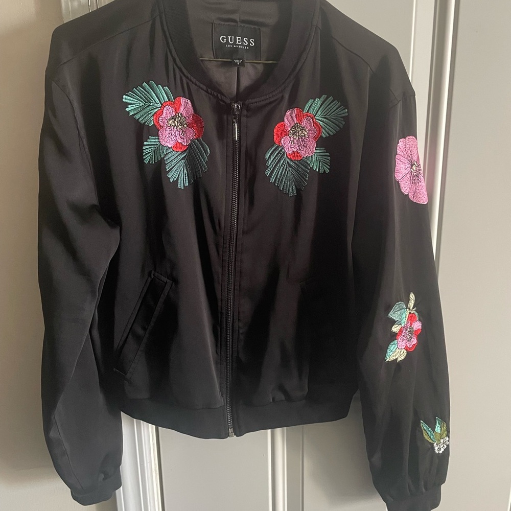 Female Guess light jacket. Very fashionable- statement piece!